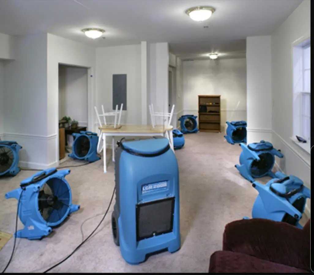 Air movers and dehumidifier setup for Water Damage Restoration in Durham